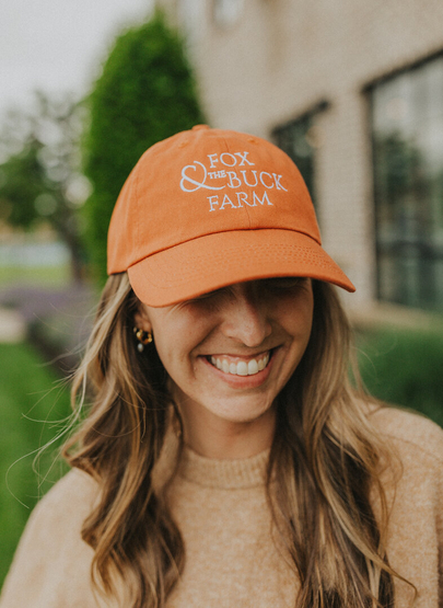 Customer wearing a VC300 Valucap Bio-Washed Cap