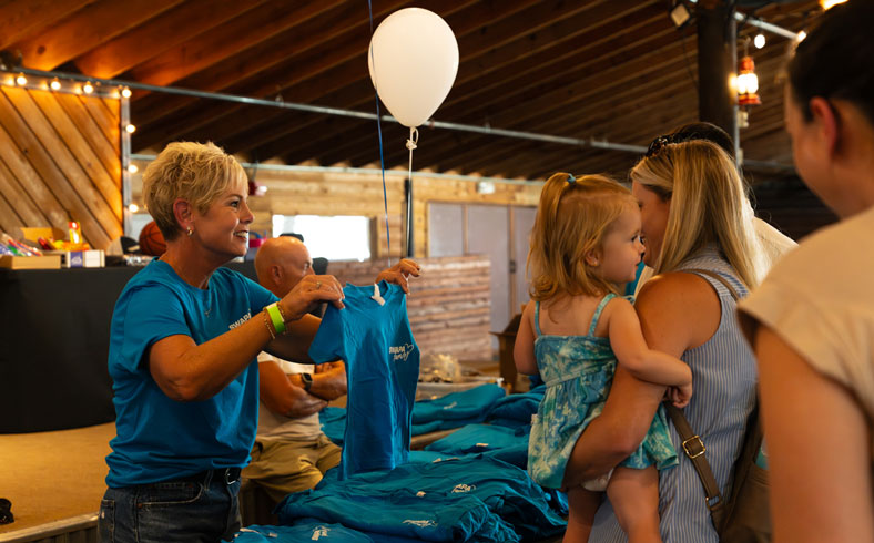 Group shot depicitng serval people wearing custom apparel
