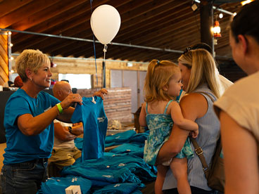 Group shot depicitng serval people wearing custom apparel