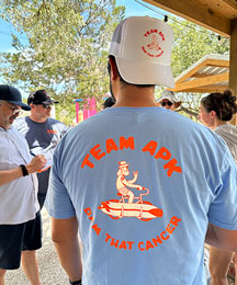 Group shot depicitng serval people wearing custom apparel