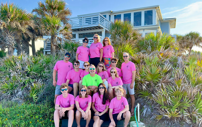 Group shot depicitng serval people wearing custom apparel